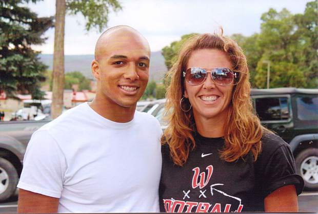 Suzanne Ekeler-Adams pictured with her son, Austin Ekeler, a professional football player known for his career in the National Football League.